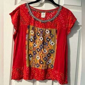 Colorful, embroidered top by Tiny
